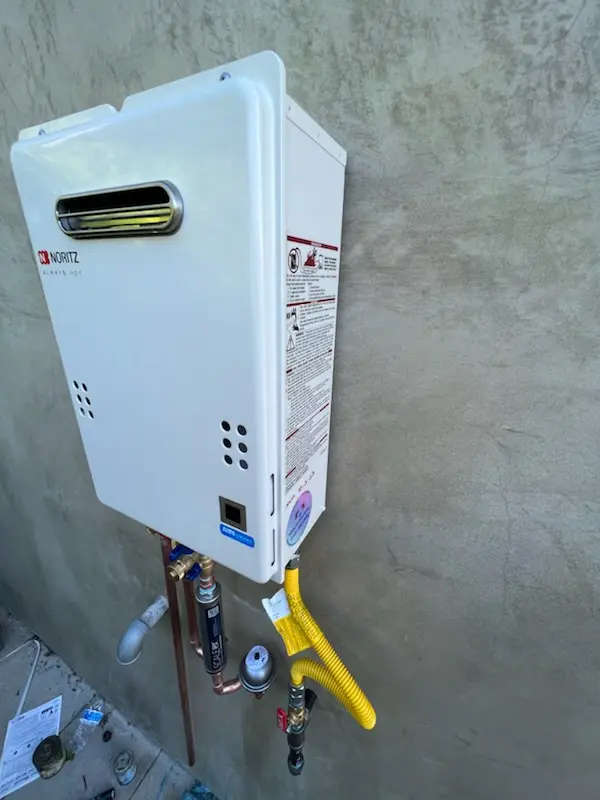 Tankless water heater installation for Piñata District homes